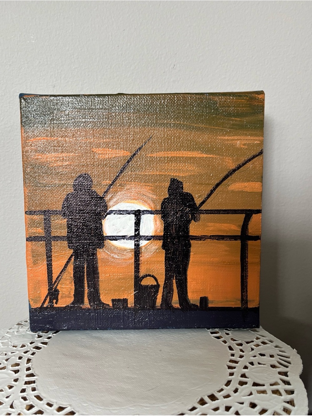 Silhouette Fishermen Sunset Canvas Art in Orange and Black